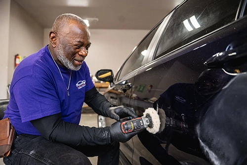 Buffing - Prestige Collision Services happy-customer-at-Karl-Malone's-Body-and-Paint